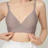 Chantelle's Secret Tri-Cup Daily Seamless Bra in taupe, demonstrating its sleek V-neck design for a smooth silhouette under clothing.
