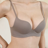 Chantelle's Secret Sculpting Wireless Seamless Bra in coffee color, showing the snug fit and detailed texture on the band for all-day comfort.