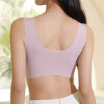 Rear view of a Chantelle's Secret seamless sports bra in pink, displaying the smooth, low-cut back design for comfort and ease of movement.